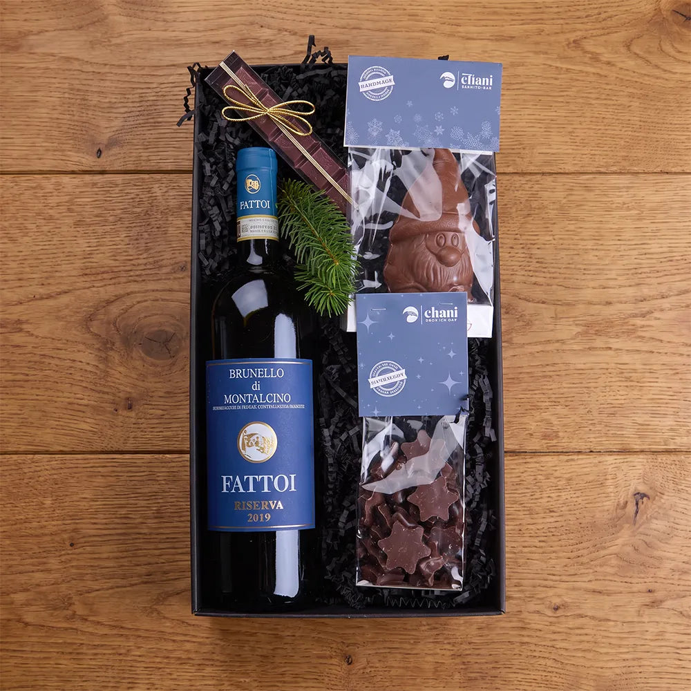 Weihnachtsgeschenk mit Rotwein und Weihanchtsschokolade