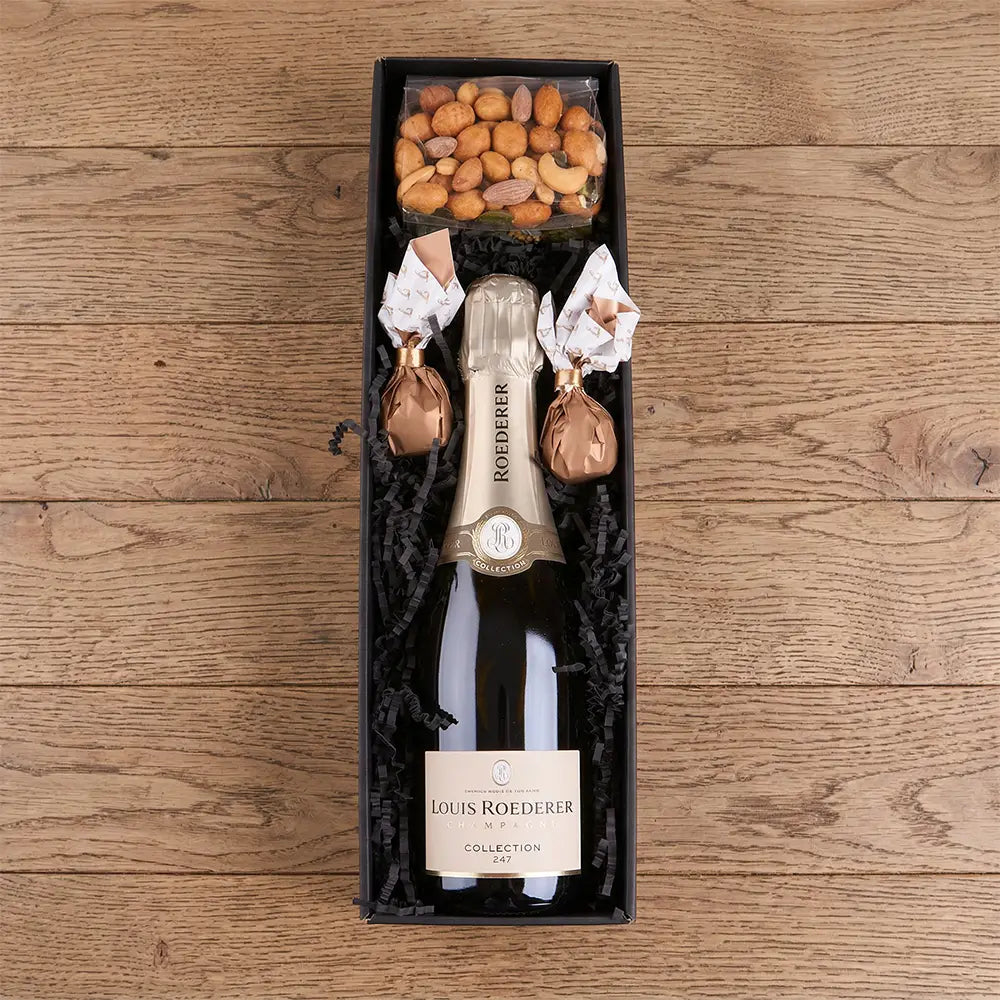 Champagner Geschenkbox mit Louis Roederer Champagner, Feigen Pralinen und edlen Snacks in luxuriöser Verpackung