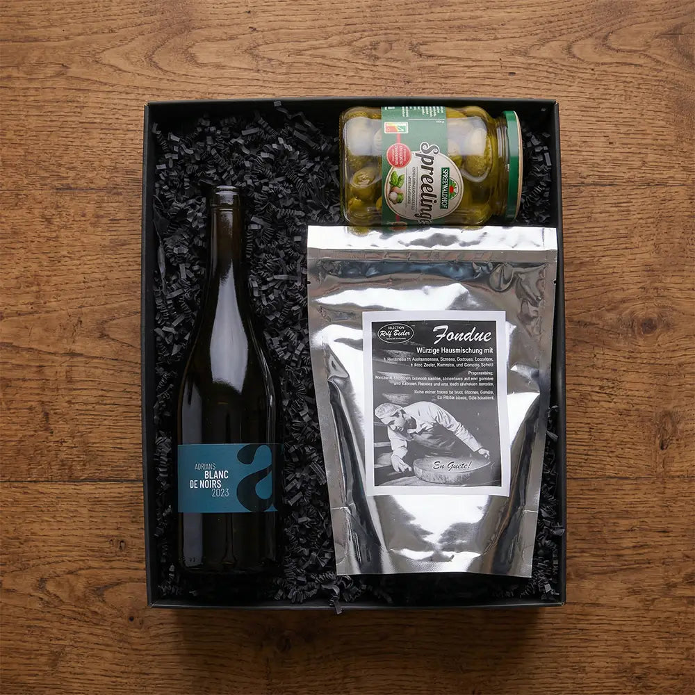 Geschenkkorb mit Rolf Beeler Fondue Mischung, Weißwein und Beilagen in edler Geschenkbox